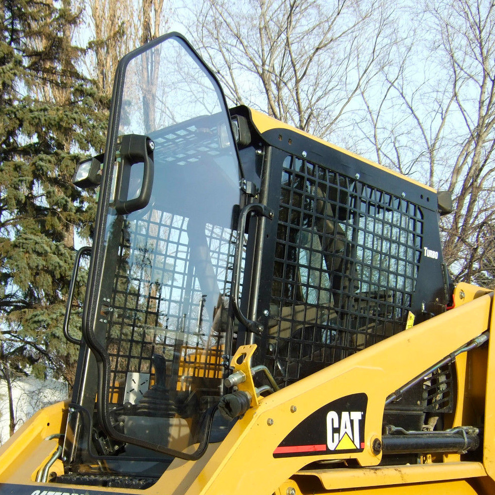 Experienced operator sectioning hazardous tree near structure with careful precision